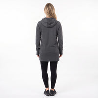 A woman viewed from behind wearing a dark gray heathered hooded sweatshirt, black leggings, and black sneakers against a plain white studio background.