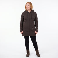 A woman modeling a dark brown hooded zip-up jacket, black leggings, and brown lace-up boots against a plain white studio background.